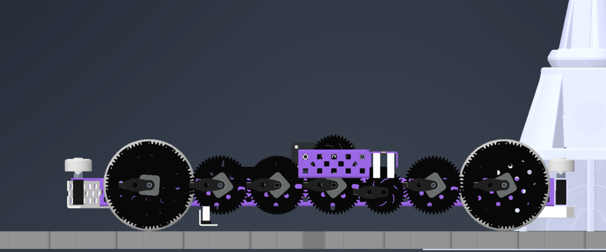 A right view of a drivetrain with the exterior C-channel removed, showing gearing and bearings
